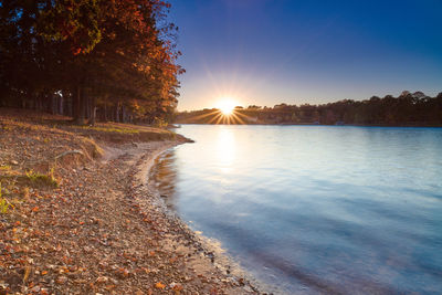 Sunset along the shoreline of lake keowee, sc.