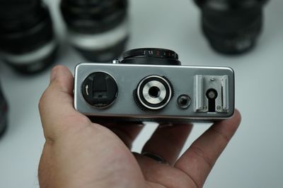 Close-up of hand holding camera