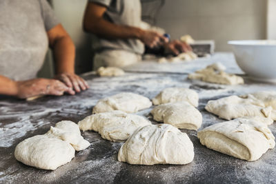 Midsection of woman preparing food