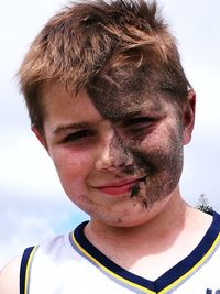 Portrait of smiling mid adult man against sky