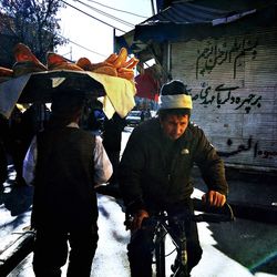 Man standing on bench