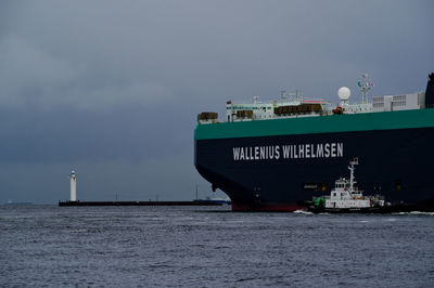 View of ship in sea against sky