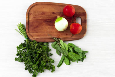 High angle view of vegetables on cutting board