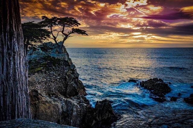 SCENIC VIEW OF SEA AT SUNSET