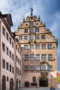 Low angle view of buildings against sky