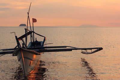 Boat moored in sea