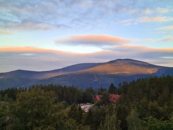 Scenic view of mountains against sky during sunset