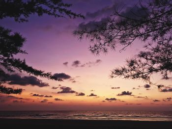 Scenic view of sea against sky at sunset