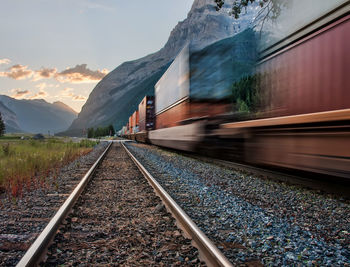 Train on railroad track against sky