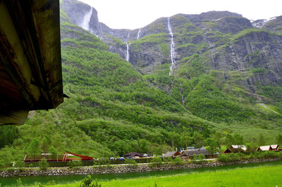 Scenic view of green landscape and mountains