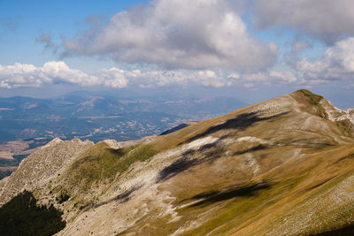 Scenic view of rocky mountains against sky