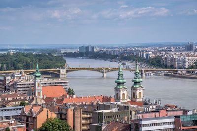 Panoramic view of the danube river and the embankment of budapest, hungary, on a summer morning