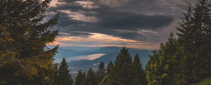 Scenic view of mountains against sky at sunset