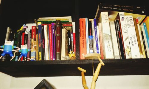 Close-up of books on shelf