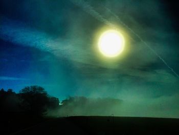 Scenic view of landscape against sky at night