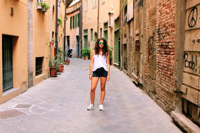 Woman standing on street