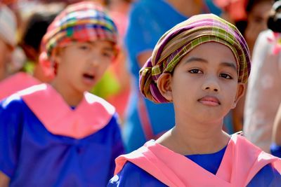 Close-up portrait of boy standing outdoors