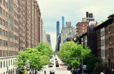 Street amidst buildings against sky