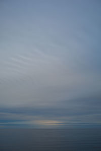 Scenic view of calm sea against sky