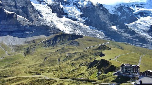 Scenic view of snow covered mountains