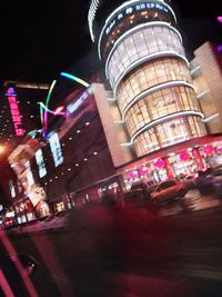 View of city lit up at night