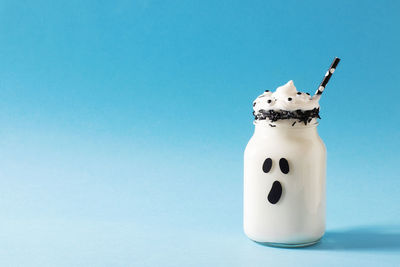 Close-up of drink against white background