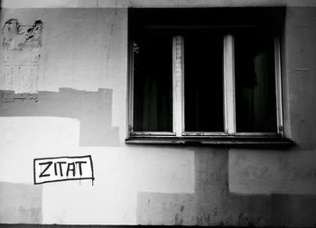 Text on window of building