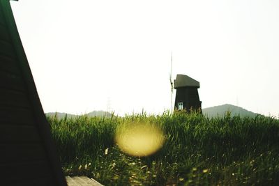 Built structure on field against clear sky