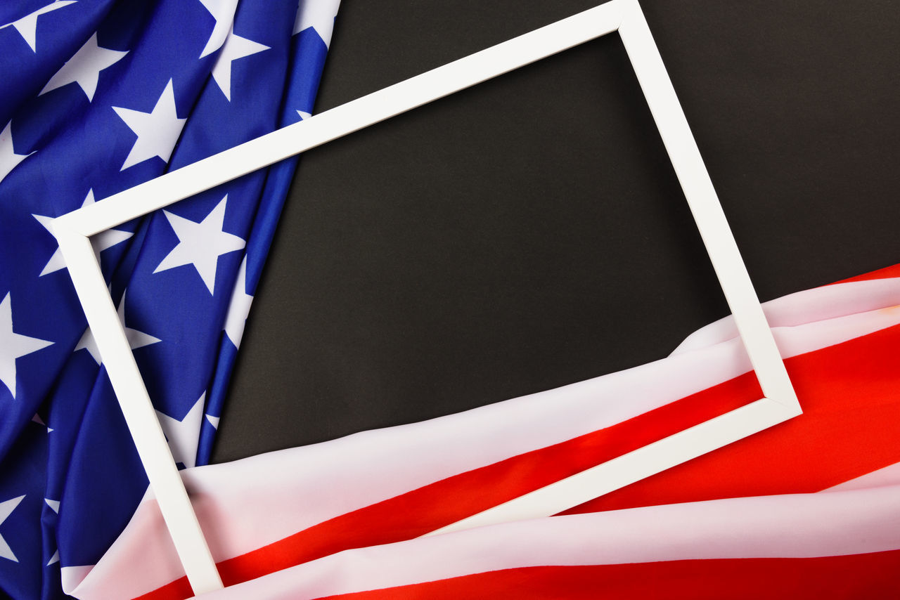 FULL FRAME SHOT OF FLAG WITH UMBRELLA