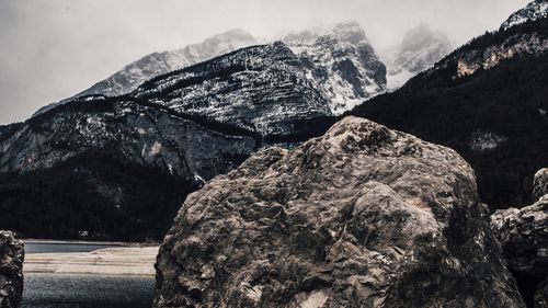 Scenic view of rocks in mountains against sky