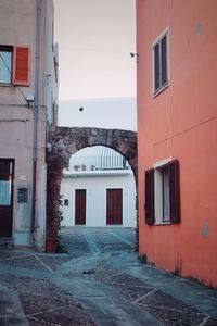 Alley amidst buildings in town