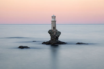 Tourlitis lighthouse at sunset, andros, greece
