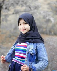 Portrait of a smiling young woman