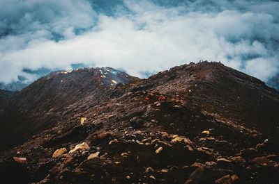 Aerial view of volcanic landscape against sky