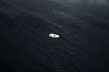 CLOSE-UP OF BOAT IN SEA