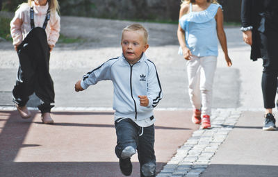 People walking on street in city