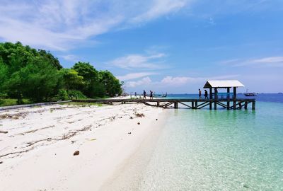 Scenic view of beach against sky