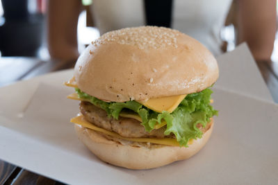 High angle view of burger served on table