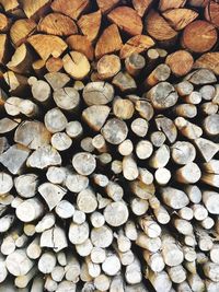 Full frame shot of logs stack at lumber industry