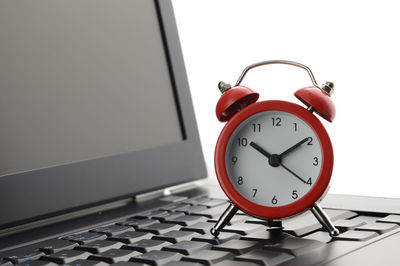 Close-up of clock on table