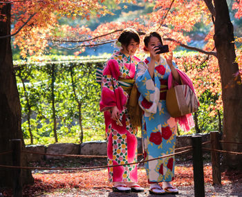 Men standing in traditional clothing