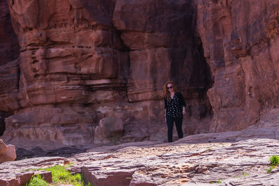 Full length of man standing on rock