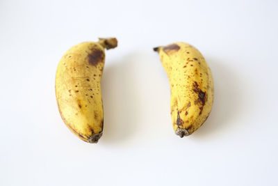Close-up of lemon against white background