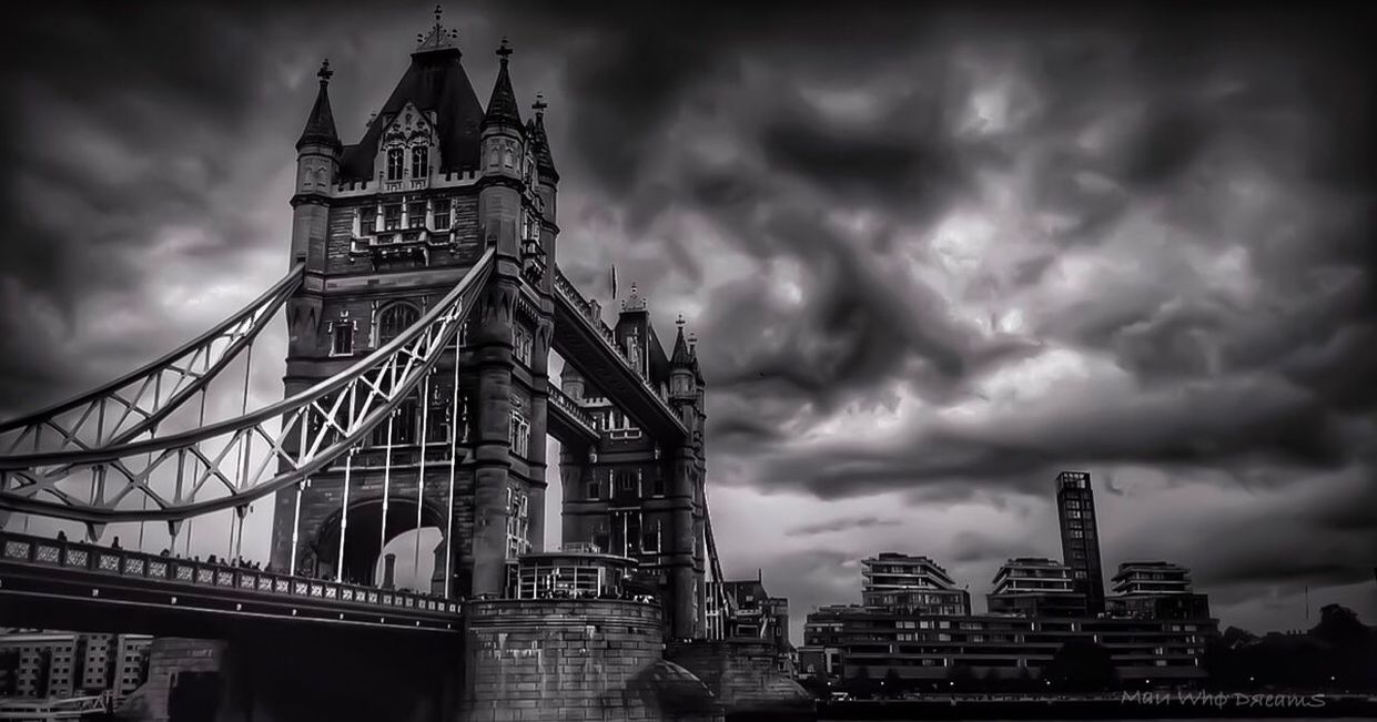 architecture, sky, cloud - sky, built structure, travel destinations, bridge - man made structure, building exterior, connection, tourism, outdoors, travel, city, no people, low angle view, day