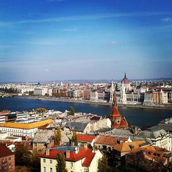 Cityscape against blue sky