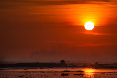 Scenic view of sunset against sky