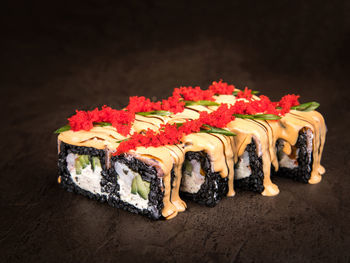 Close-up of sushi served on table