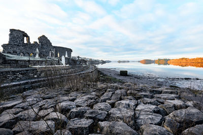 Panoramic view of a temple against cloudy sky