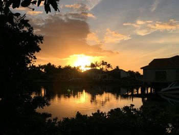 Scenic view of lake at sunset