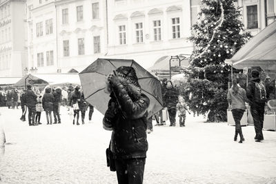 Woman standing in city